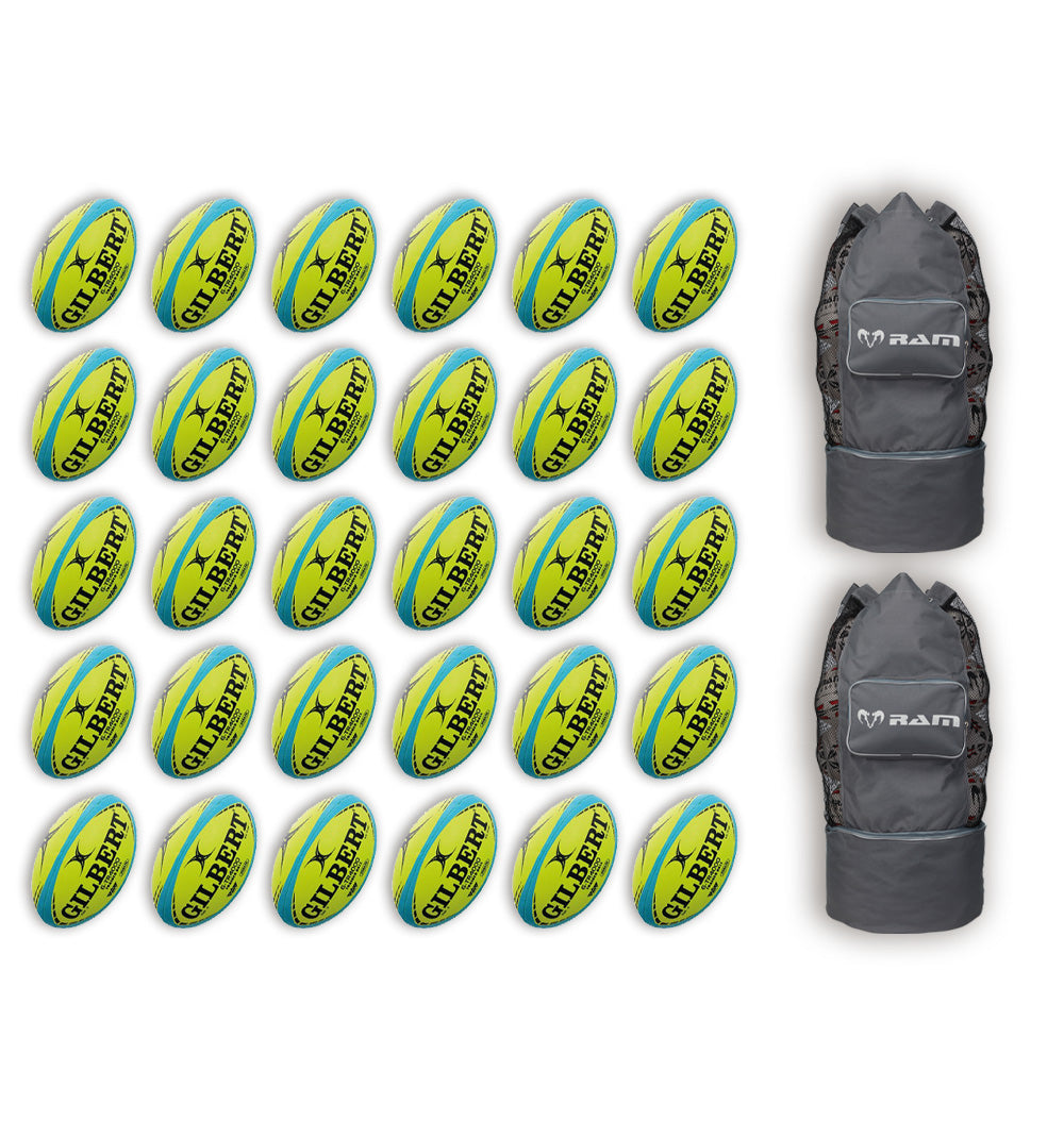 Stack of 30 Gilbert G-TR4000 trainer rugby balls with two large breathable bags for size 5 ball storage and transport