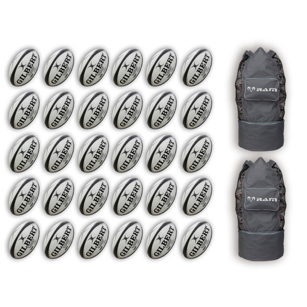 Thirty Gilbert G-TR4000 size 5 trainer rugby balls stacked with two large breathable black ball bags for easy transport and storage
