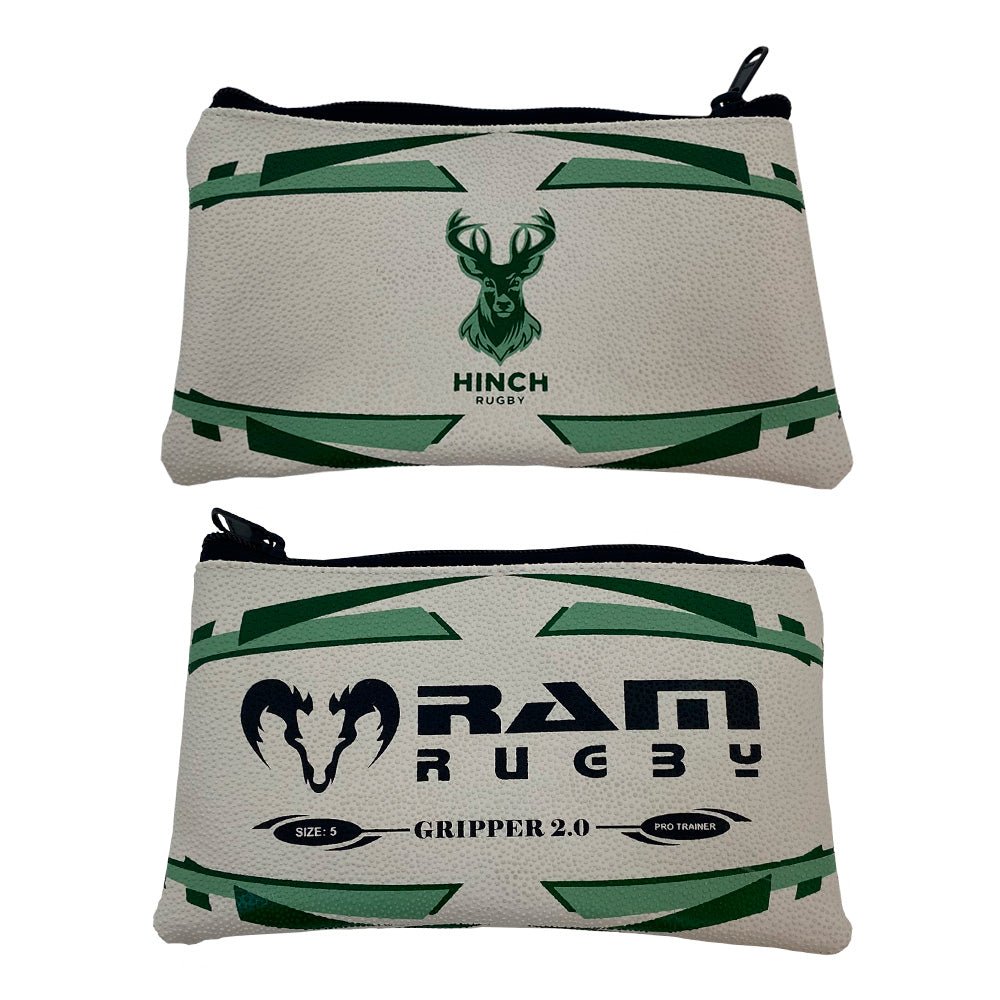 Ram Rugby custom rugby ball pencil case in brown rubber with realistic grip texture and logo personalization detail.