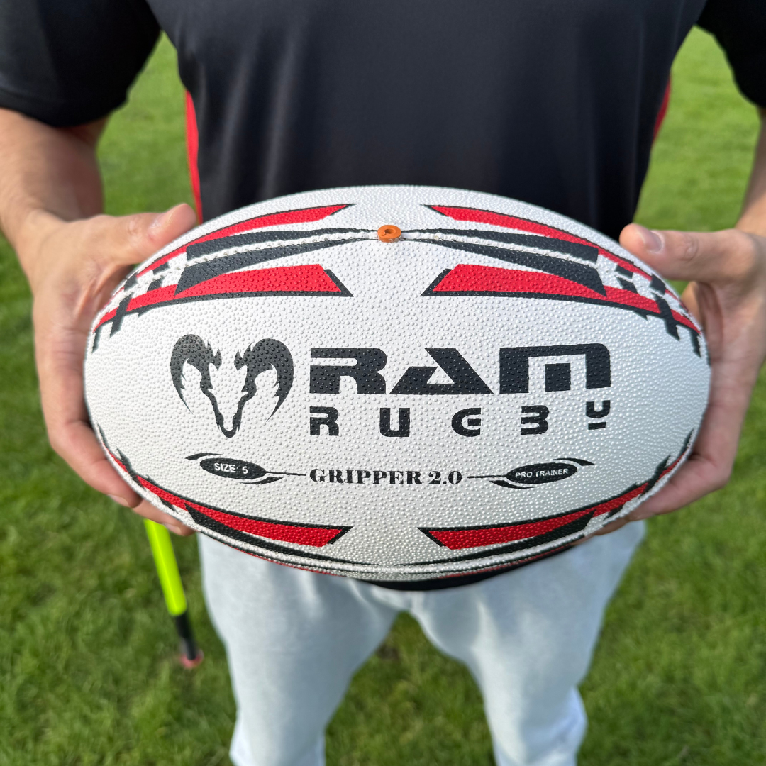 Rugby balls and kit laid out for sevens, tens and fifteens rugby