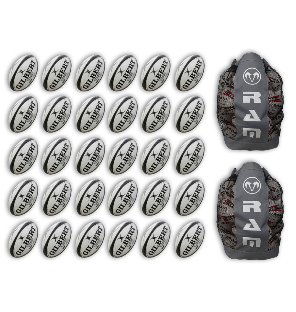 Stack of 30 Gilbert G-TR4000 trainer rugby balls in white and red with 2 large breathable ball bags for easy transport