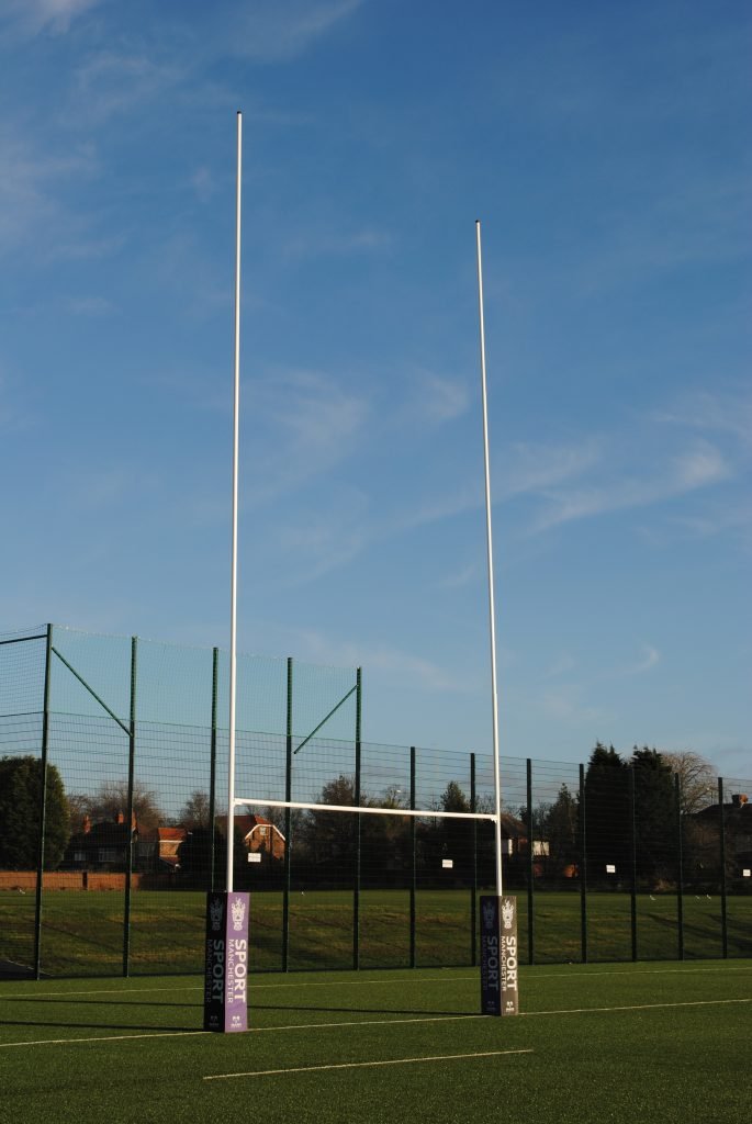 Ram Rugby 13m white aluminium hinged rugby goal posts pair with three-piece uprights and crossbars for sports fields