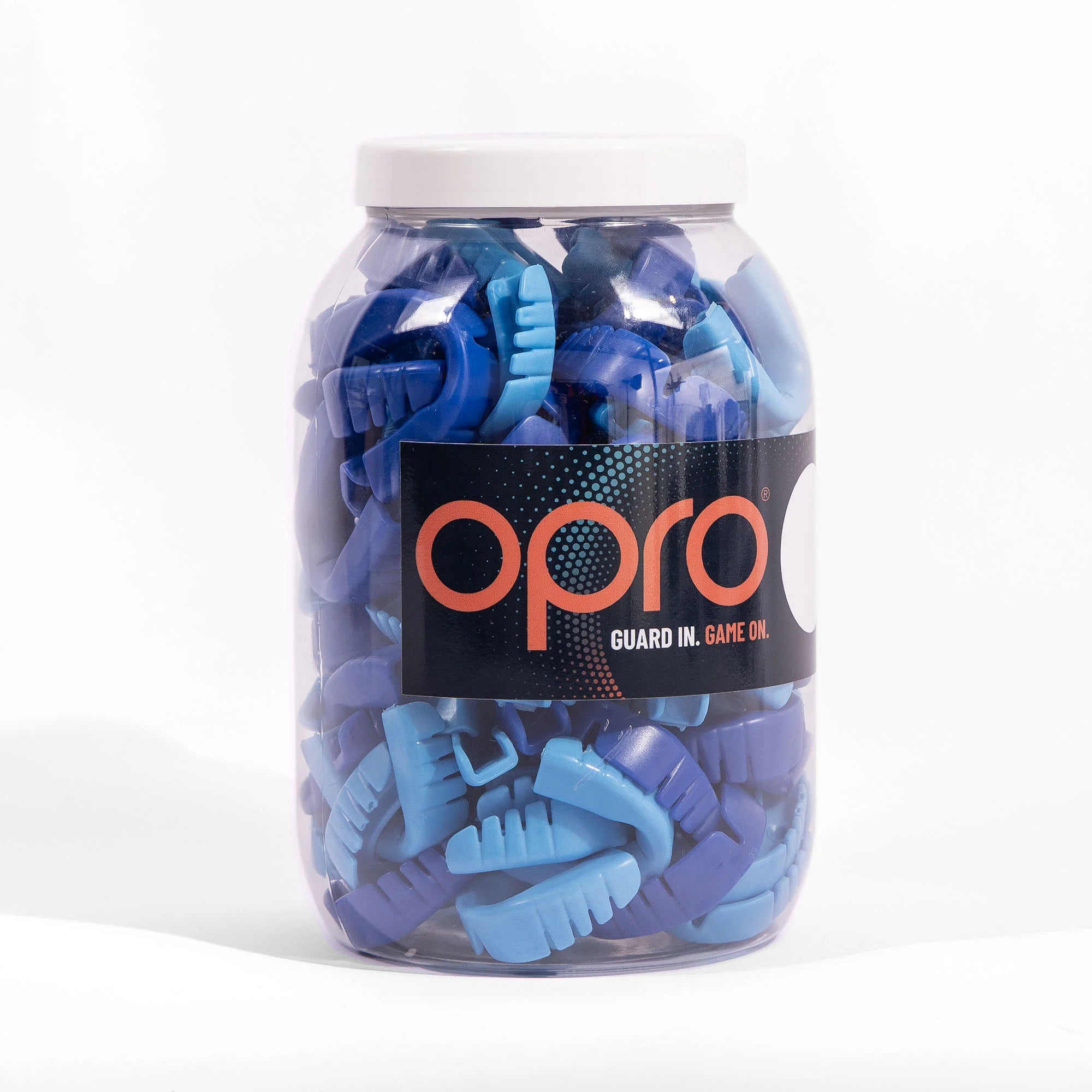 Opro Rugby Snap-Fit Value Tub containing 100 loose dark blue mouthguards for team sports and training protection